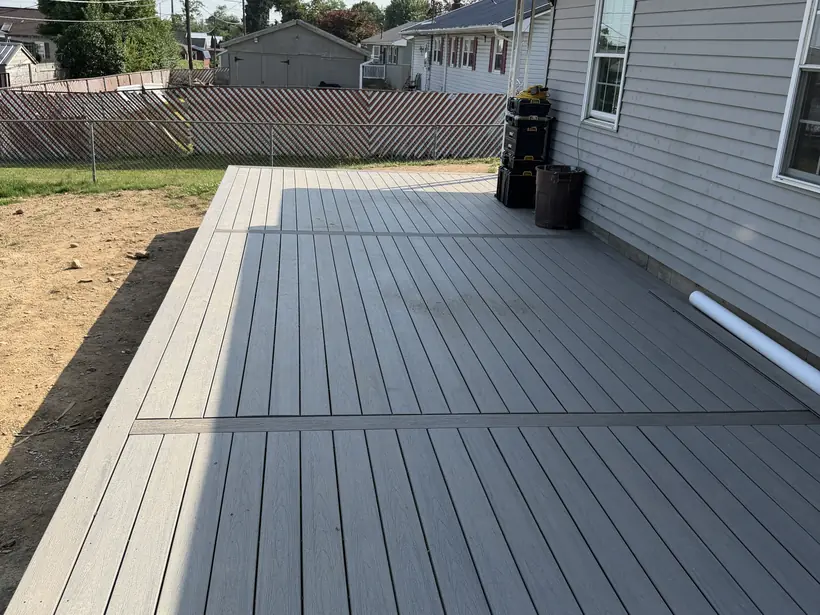 Composite deck boards run out to the edge of the finished surface