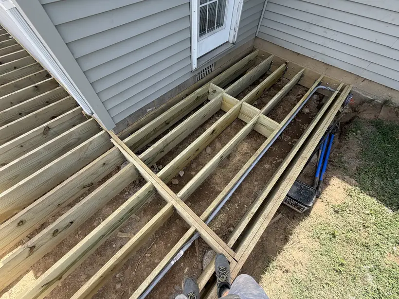 Low view along the deck joists during framing