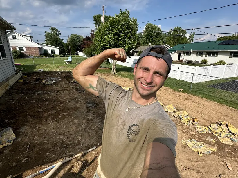 Mike Smego on site after pouring the deck footings by hand