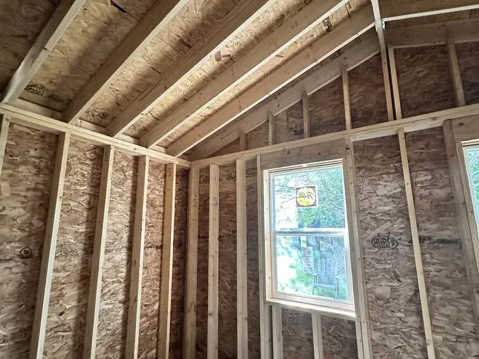 Interior of the framed and insulated addition before drywall